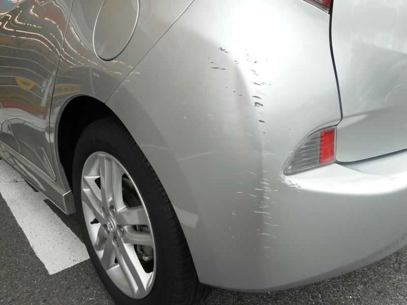 ラクティス　リヤバンパー左